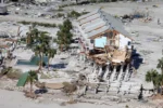 In an aerial view, damaged buildings are seen as Hurricane Ian passed through the area on September 29, 2022 in Fort Myers Beach, Florida.