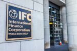 The outside of a building with a sign that says "IFC International Finance Corporation World Bank Group"