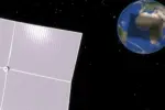 A spaceshield hovers in front of the earth in outer space, casting its shadow over the African continent.