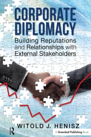 Book cover that says "Corporate Diplomacy: Building Reputations and Relationships with External Stakeholders" by "Witold J. Henisz." The cover is a puzzle with a blue background and two people shaking hands.