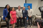 from left to right: Cherri Gregg, Nancy Ayllón-Ramírez, Zeke Hernandez, Guy Ciarrocchi, Avi Wolfman-Arent having their photo taken in the WHYY studio.