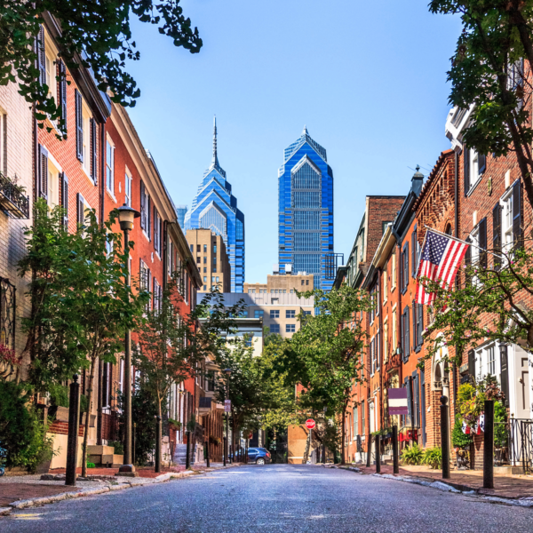 Decorative photo of the streets of Philadelphia with the skyline in the back